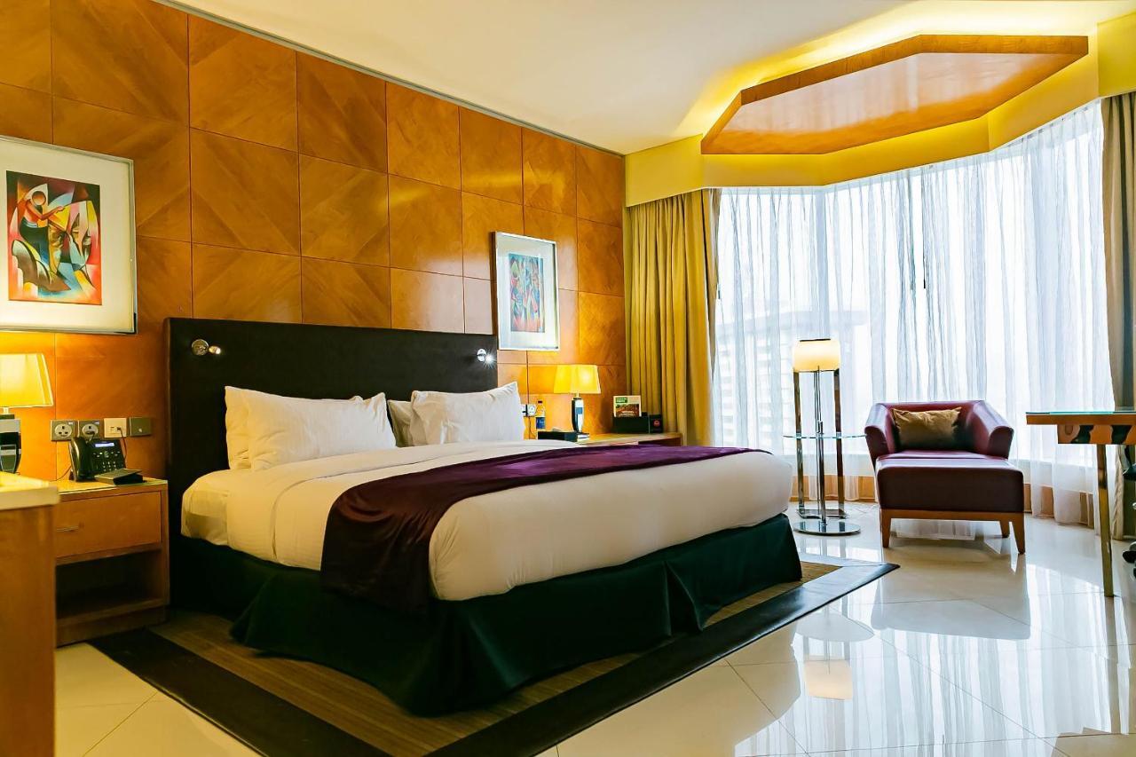 Lagos Continental Hotel Esterno foto A bedroom at the hotel